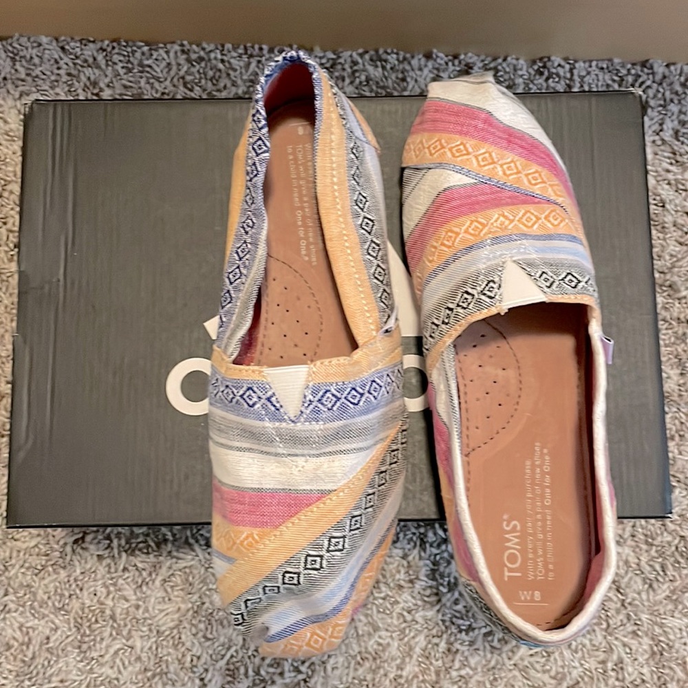 Tom’s slip ons.  W8 colorful pattern